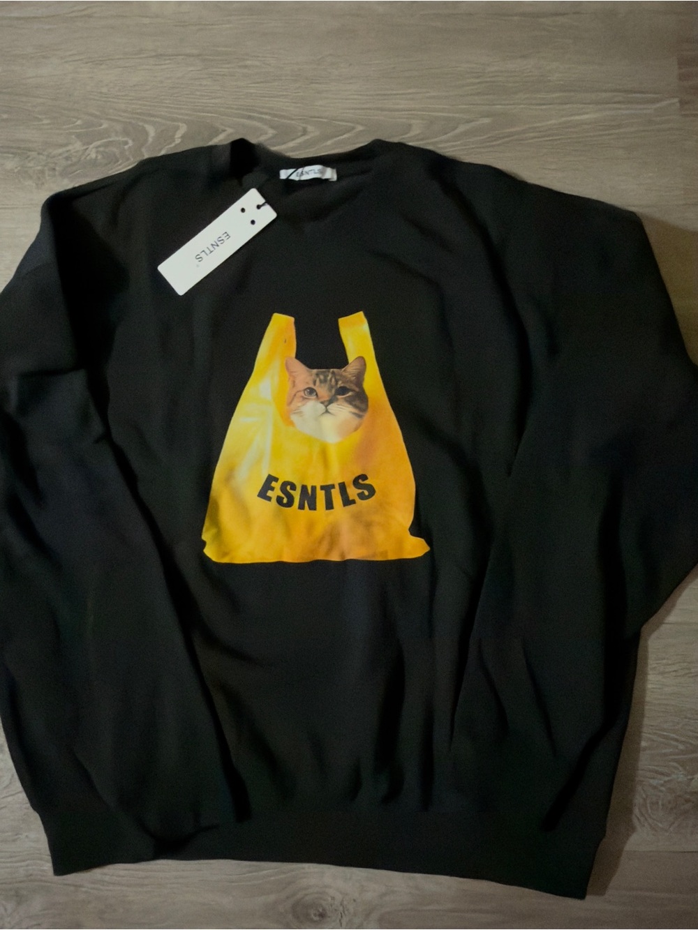 ESNTLS Black Sweatshirt with Yellow Cat Bag Graphic